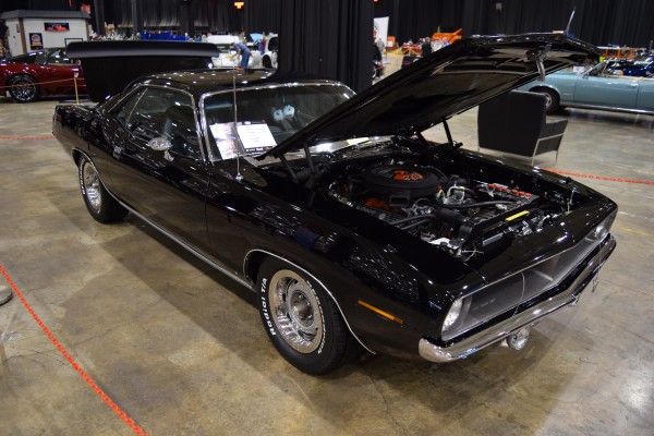 plymouth barracuda muscle car at indoor car show