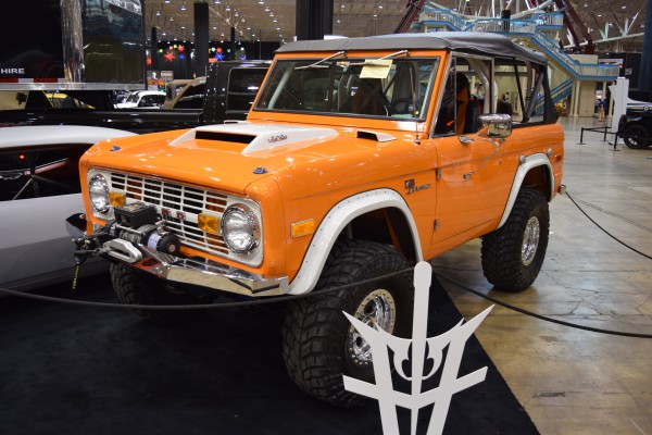 first gen ford bronco at indoor car show