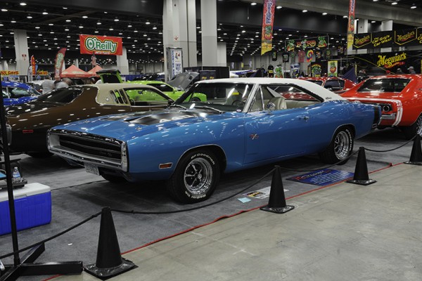 blue 1970 dodge charger muscle car at indoor car show
