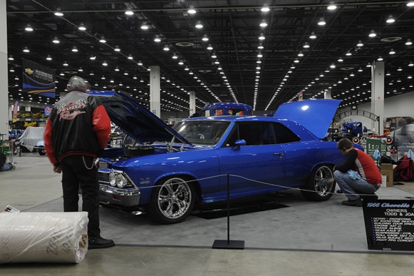 blue 1966 chevy chevelle at indoor car show