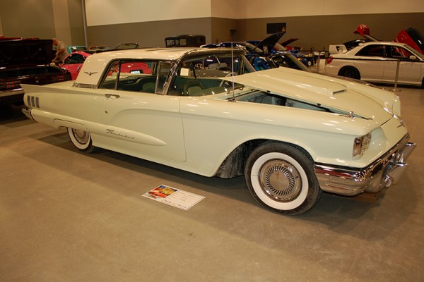 ford thunderbird hardtop coupe at indoor car show