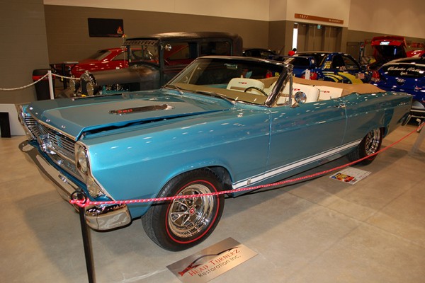vintage muscle car convertible at indoor car show