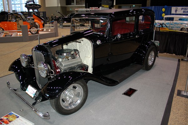 ford tudor coupe at indoor car show
