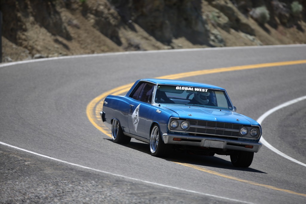pro touring chevy chevelle driving down road