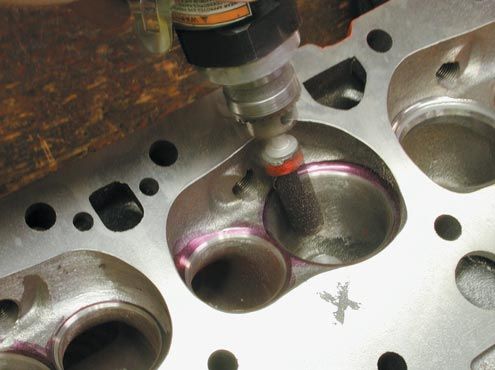 polishing an engine port in a cylinder head