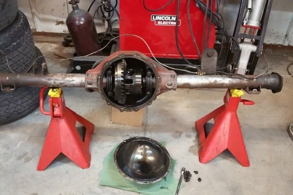 an amc 20 axle being serviced on jack stands