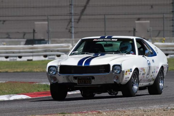1969 AMC AMX being driven on road course track