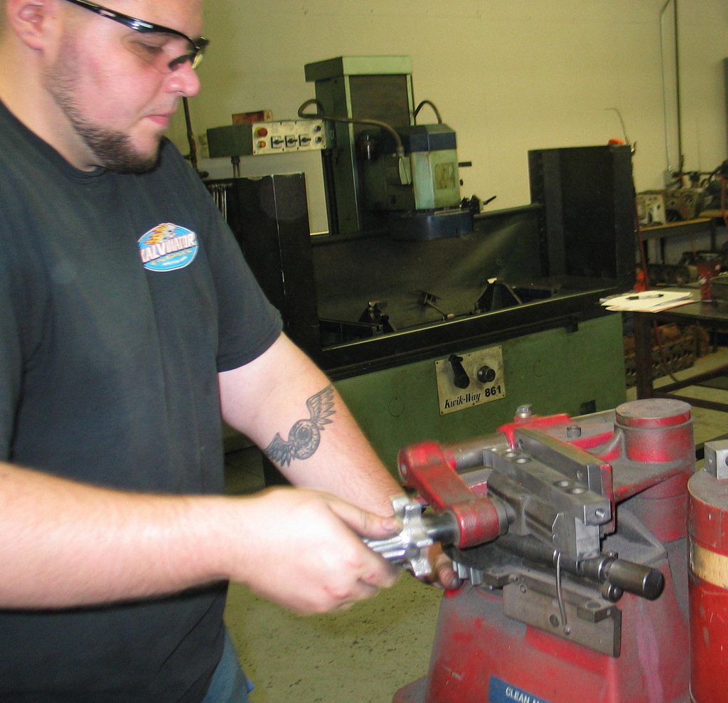 cutting man caps at engine machine shop