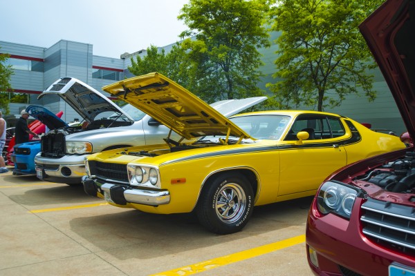 yellow plymouth road runner fuselage car at show