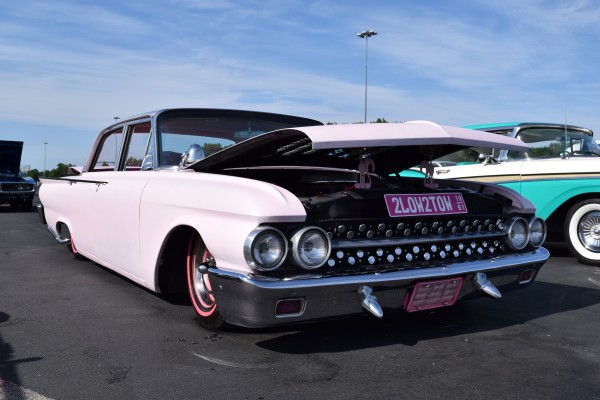 vintage pink lowrider sedan hot rod