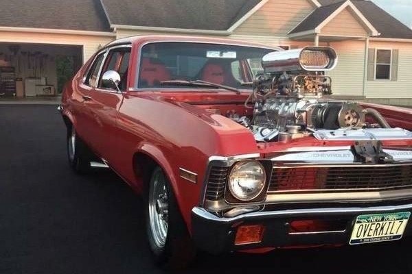 front view of supercharged engine in chevy nova drag car