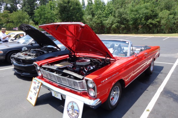 ford convertible galaxie coupe at a car show