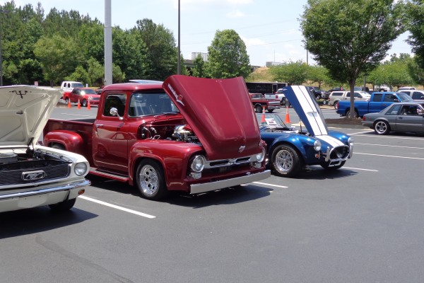 classic ford cars and trucks at a car show