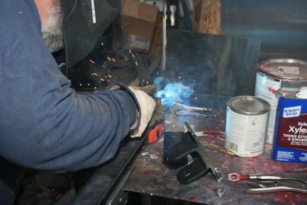 welding tow bar brackets on a bumper