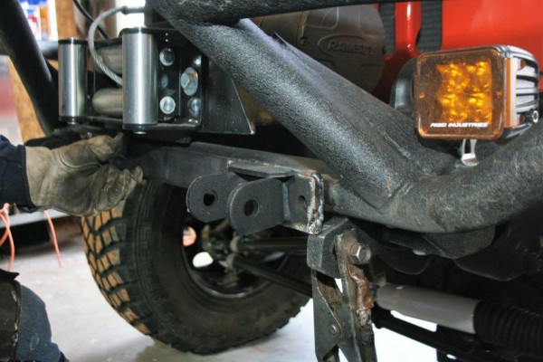 tow bar brackets welded on a jeep wrangler bumper