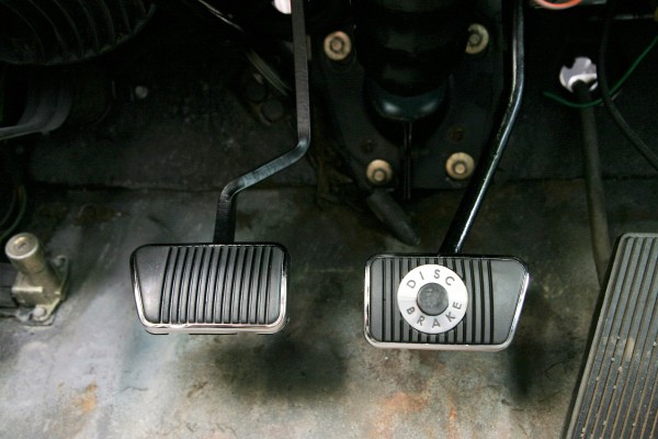custom pedals installed in a muscle car