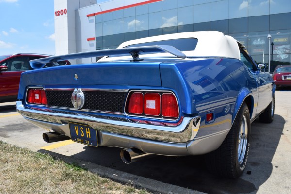 rear taillight and bumper view of a blue 1972 ford mustang mach 1 convertible