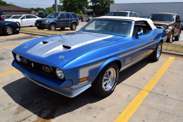 high quarter view of a blue 1972 ford mustang mach 1 convertible