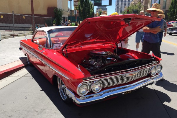 chevy impala bubbletop coupe with hood up at Hot August Nights 2016