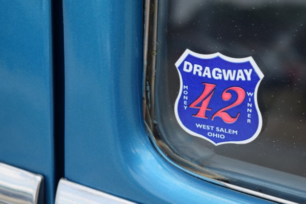 vintage dragway 42 sticker on the window of an old hotrod