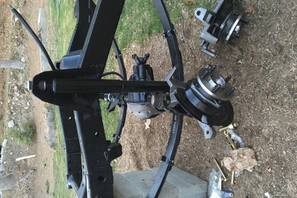 axle and shock installed on a bare jeep wrangler yj frame