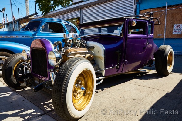 ford hot rod with a sbc engine at a car show