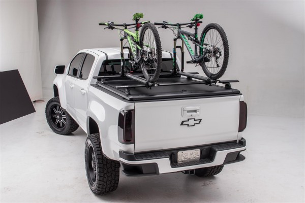 truck with bicycles on rack over truck bed