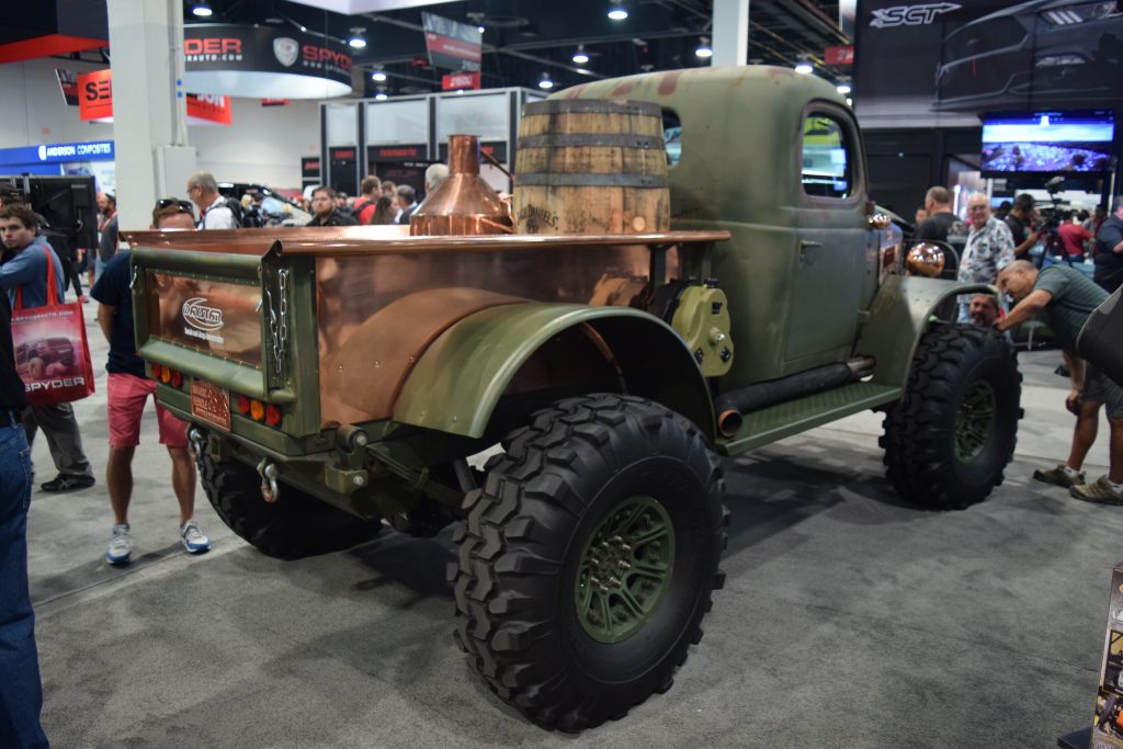 vintage truck on display at SEMA 2016 with moonshine still