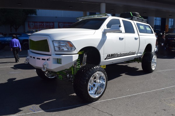 lifted white ram truck on display at SEMA 2016