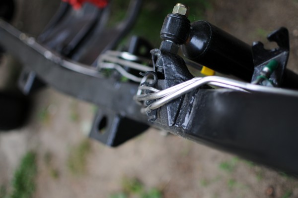 brake hard lines clipped to frame of jeep wrangler yj