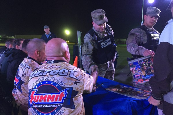 bigfoot drivers signing autographs and meeting troops