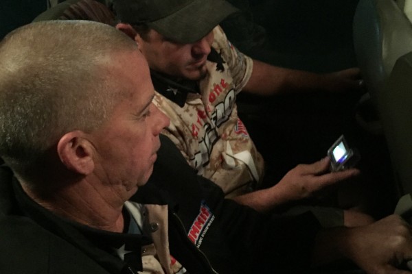 bigfoot drivers reviewing footage from recent monster truck show