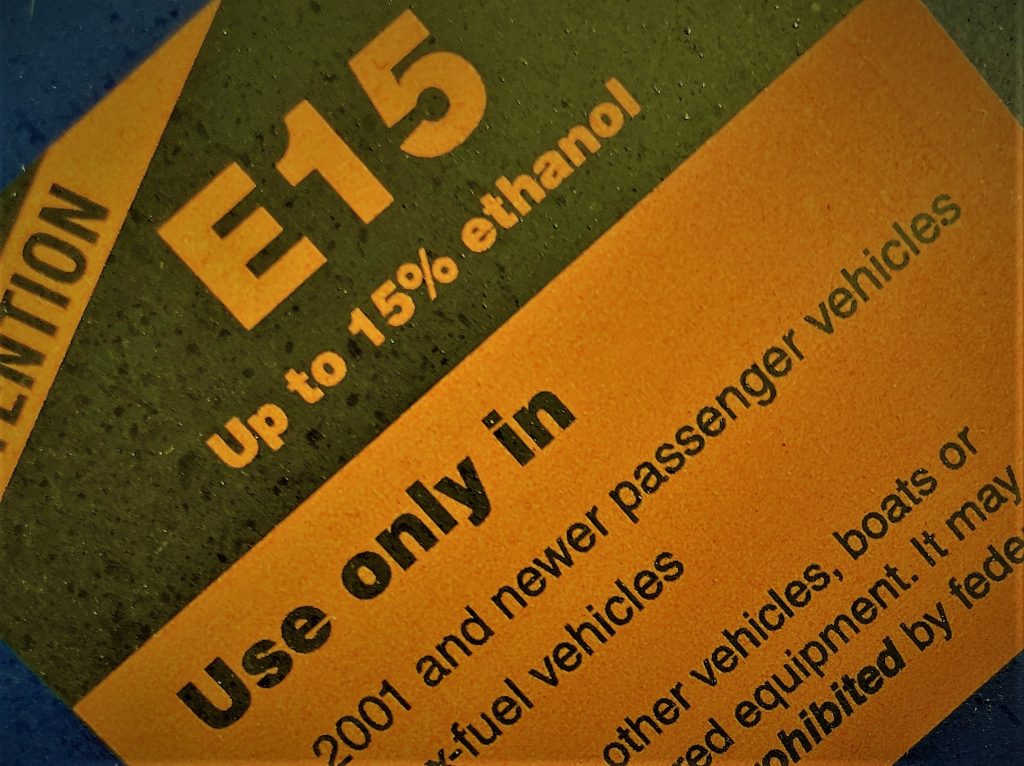 stylized photo of an ethanol sticker on a gas pump