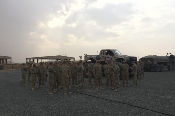 troops surrounding bigfoot monster truck