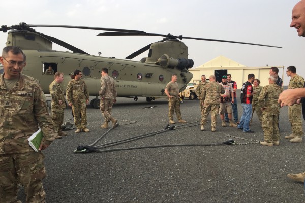 military personnel near chinook helicopter