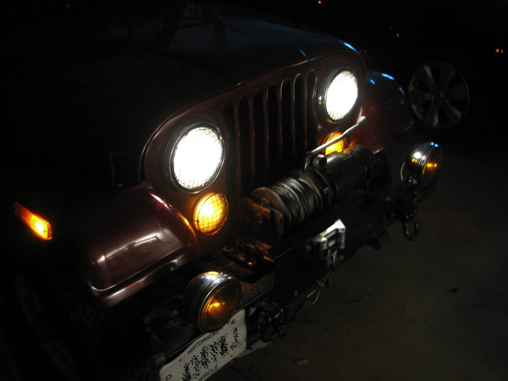 front of vintage jeep cj with headlight relay upgrade