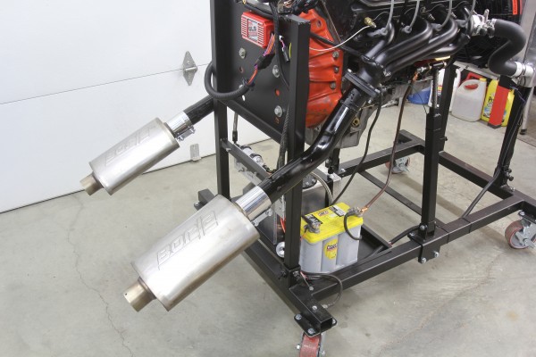 borla mufflers installed on engine in summit racing run stand
