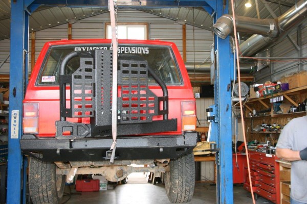 installing a spare tire carrier and off road bumper on an xj cherokee