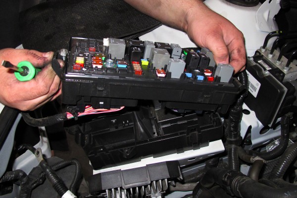 removing and installing main engine fuse box