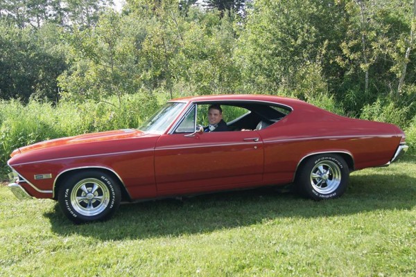 man in 1968 chevy chevelle ss 396