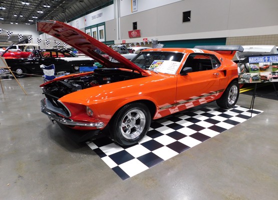 orange 1969 ford mustang coupe