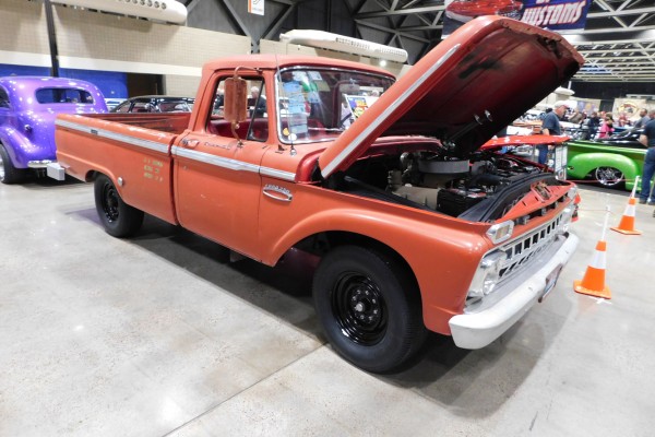 vintage ford pickup truck at a car show