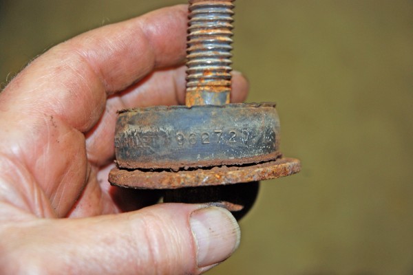 old, rusted body to frame bolt and bushing
