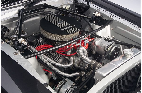 engine bay of a custom 1965 ford mustang