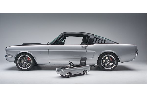 side profile view of a custom 1965 ford mustang with pedal car