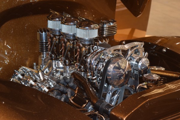 three deuces carburetor setup on a flathead ford v8
