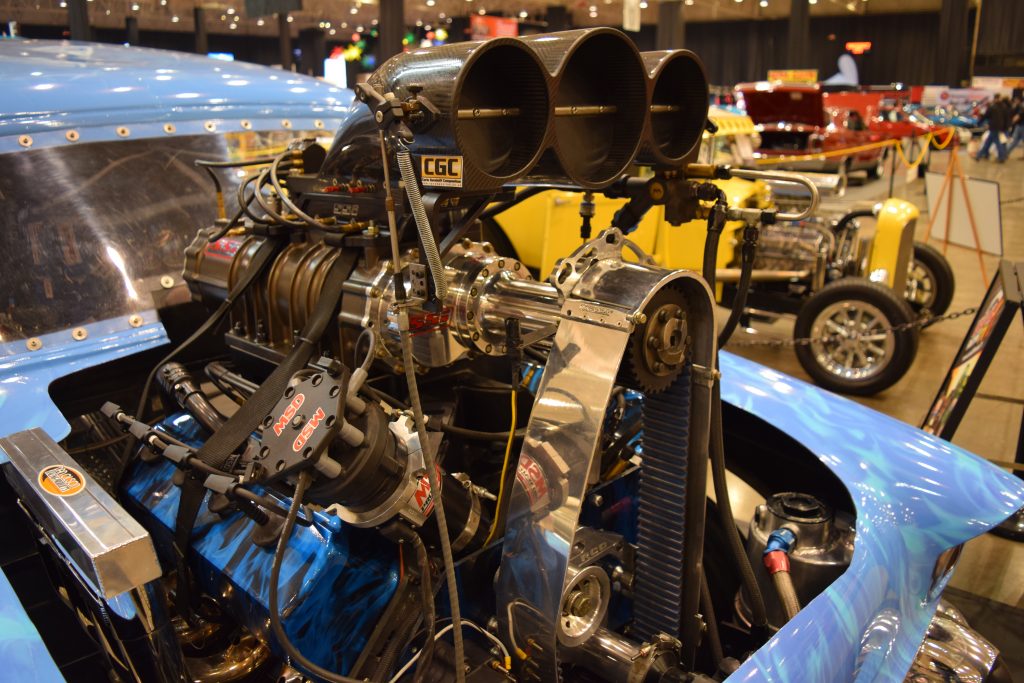 supercharged v8 engine in an altered pro mod drag car