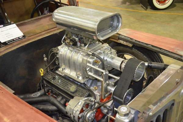 supercharged blow small block chevy engine in a rat rod