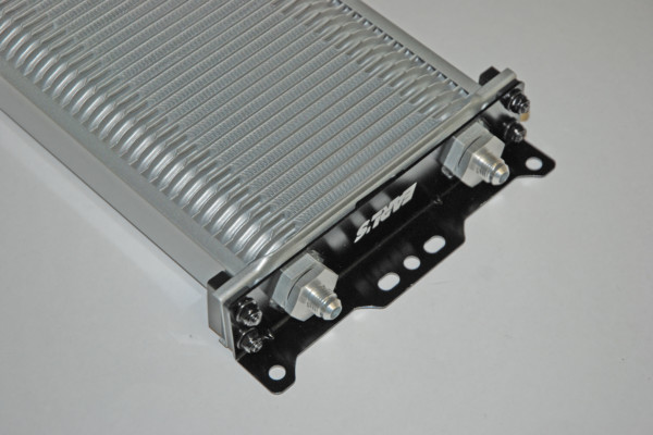 fittings on the end of an oil cooler