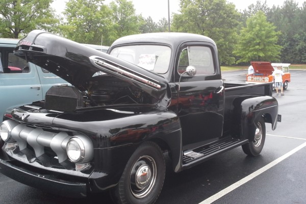 vintage ford f-1 at a car show